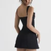 Adriana – Minikleid aus schwarzem Satin und Spitze Adriana – Minikleid aus schwarzem Satin und Spitze