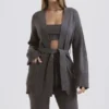 Alaia Strickjacke aus Kaschmirmischung in Anthrazit mit Gürtel Alaia Strickjacke aus Kaschmirmischung in Anthrazit mit Gürtel