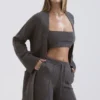 Alaia Strickjacke aus Kaschmirmischung in Anthrazit mit Gürtel Alaia Strickjacke aus Kaschmirmischung in Anthrazit mit Gürtel
