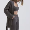 Alaia Strickjacke aus Kaschmirmischung in Anthrazit mit Gürtel Alaia Strickjacke aus Kaschmirmischung in Anthrazit mit Gürtel