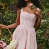 Amara Midi-Korsetts-Kleid aus Stretch-Baumwolle mit rosa Rosenprint Amara Midi-Korsetts-Kleid aus Stretch-Baumwolle mit rosa Rosenprint