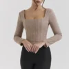 Antonia Braunes Korsetts-Oberteil mit Puppytooth-Muster Antonia Braunes Korsetts-Oberteil mit Puppytooth-Muster