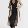 Ariel Beige Trenchcoat aus veganem Leder Ariel Beige Trenchcoat aus veganem Leder