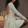 Aryana Elfenbeinfarbenes Minikleid mit Schleife Aryana Elfenbeinfarbenes Minikleid mit Schleife