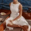 Azalina Weißes Maxikleid aus Baumwolle mit U-Boot-Ausschnitt und Knopfleiste Azalina Weißes Maxikleid aus Baumwolle mit U-Boot-Ausschnitt und Knopfleiste