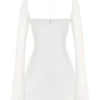 Babydoll Mini-Kleid aus elfenbeinfarbenem Chiffon mit Neckholder Babydoll Mini-Kleid aus elfenbeinfarbenem Chiffon mit Neckholder