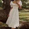Bella Weißes Babydoll-Midi-Kleid mit Broderie Anglaise Bella Weißes Babydoll-Midi-Kleid mit Broderie Anglaise