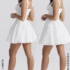 Brigitte Weißes Minikleid aus Baumwolle mit Broderie-Anglaise-Verzierung als Korsett Brigitte Weißes Minikleid aus Baumwolle mit Broderie-Anglaise-Verzierung als Korsett