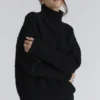 Brooklyn Schwarzer Bouclé-Strick-Pullover Brooklyn Schwarzer Bouclé-Strick-Pullover