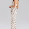 Calista Cremefarbenes Maxikleid aus Mesh mit Rosenprint Calista Cremefarbenes Maxikleid aus Mesh mit Rosenprint