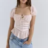 Cara Pink Lace Peplum Oberteil Cara Pink Lace Peplum Oberteil