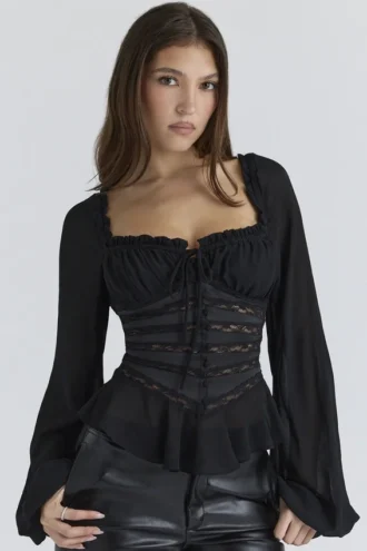 Cara – Schwarzes Langarm-Peplum-Oberteil aus Georgette