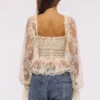 Cara Vintage Elfenbein Langarm-Spitzen-Peplum-Oberteil Cara Vintage Elfenbein Langarm-Spitzen-Peplum-Oberteil