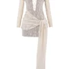 Carmelita – Kleid aus natürlichem Strick mit Schnürung Carmelita – Kleid aus natürlichem Strick mit Schnürung