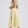 Carmen Buttercup Vintage-Bustier-Sommerkleid aus Baumwolle mit Blumenprint Carmen Buttercup Vintage-Bustier-Sommerkleid aus Baumwolle mit Blumenprint