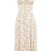 Carmen Elfenbeinfarbenes Baumwoll-Bustier-Sommerkleid mit Wiesenprint Carmen Elfenbeinfarbenes Baumwoll-Bustier-Sommerkleid mit Wiesenprint