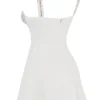 Cassandra Minikleid aus elfenbeinfarbenem Satin und Spitze Cassandra Minikleid aus elfenbeinfarbenem Satin und Spitze