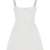 Cassandra Minikleid aus elfenbeinfarbenem Satin und Spitze Cassandra Minikleid aus elfenbeinfarbenem Satin und Spitze