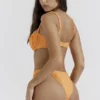 Athens Bikini-Unterteil in Hellorange mit gerafftem, hoch geschnittenem Bein Athens Bikini-Unterteil in Hellorange mit gerafftem, hoch geschnittenem Bein