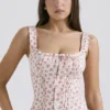 Chicca Oberteil mit weißem Rosenknospen-Print Chicca Oberteil mit weißem Rosenknospen-Print