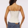 Chloe Weißes Baumwoll-Oberteil mit Broderie-Anglaise-Spitze Chloe Weißes Baumwoll-Oberteil mit Broderie-Anglaise-Spitze