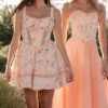 Clarabelle Pfirsichfarbenes Baumwoll-Midi-Sommerkleid mit abnehmbarem Korsett Clarabelle Pfirsichfarbenes Baumwoll-Midi-Sommerkleid mit abnehmbarem Korsett