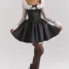 Cleora Schwarzes Minikleid mit Spitzenrüschen Cleora Schwarzes Minikleid mit Spitzenrüschen