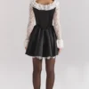 Cleora Schwarzes Minikleid mit Spitzenrüschen Cleora Schwarzes Minikleid mit Spitzenrüschen
