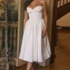Coco Vintage Midi-Kleid aus elfenbeinfarbenem Satin Coco Vintage Midi-Kleid aus elfenbeinfarbenem Satin