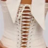 Cosette Weißes Baumwoll-Oberteil mit Neckholder Cosette Weißes Baumwoll-Oberteil mit Neckholder