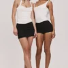 Das Peekaboo Ivory Neckholder-Korsetts-Oberteil Das Peekaboo Ivory Neckholder-Korsetts-Oberteil