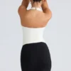Das Peekaboo Ivory Neckholder-Korsetts-Oberteil Das Peekaboo Ivory Neckholder-Korsetts-Oberteil