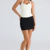 Das Peekaboo Ivory Neckholder-Korsetts-Oberteil Das Peekaboo Ivory Neckholder-Korsetts-Oberteil