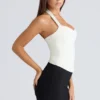 Das Peekaboo Ivory Neckholder-Korsetts-Oberteil Das Peekaboo Ivory Neckholder-Korsetts-Oberteil