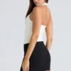 Das Peekaboo Ivory Neckholder-Korsetts-Oberteil Das Peekaboo Ivory Neckholder-Korsetts-Oberteil