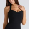 Das schwarze Peekaboo-Halter-Korsetts-Oberteil Das schwarze Peekaboo-Halter-Korsetts-Oberteil