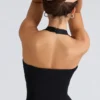 Das schwarze Peekaboo-Halter-Korsetts-Oberteil Das schwarze Peekaboo-Halter-Korsetts-Oberteil