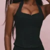 Das schwarze Stretch-Korsetts-Oberteil mit Neckholder Das schwarze Stretch-Korsetts-Oberteil mit Neckholder