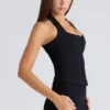 Das schwarze Stretch-Korsetts-Oberteil mit Neckholder Das schwarze Stretch-Korsetts-Oberteil mit Neckholder