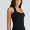 Das schwarze Stretch-Korsetts-Oberteil mit Neckholder Das schwarze Stretch-Korsetts-Oberteil mit Neckholder