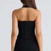 Das schwarze Stretch-Korsetts-Oberteil mit Neckholder Das schwarze Stretch-Korsetts-Oberteil mit Neckholder