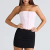 Das trägerlose rosa Stretch-Korsetts-Oberteil Das trägerlose rosa Stretch-Korsetts-Oberteil