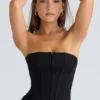 Das trägerlose schwarze Stretch-Korsetts-Oberteil Das trägerlose schwarze Stretch-Korsetts-Oberteil