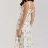 Dionne Cremefarbenes Midi-Kleid aus Stretch-Baumwolle mit Gänseblümchen-Print Dionne Cremefarbenes Midi-Kleid aus Stretch-Baumwolle mit Gänseblümchen-Print