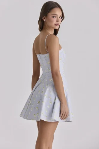 Dolly Blaues Baumwoll-Sommerkleid mit Wildblumen-Print Dolly Blaues Baumwoll-Sommerkleid mit Wildblumen-Print