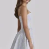 Dolly Blaues Baumwoll-Sommerkleid mit Wildblumen-Print Dolly Blaues Baumwoll-Sommerkleid mit Wildblumen-Print