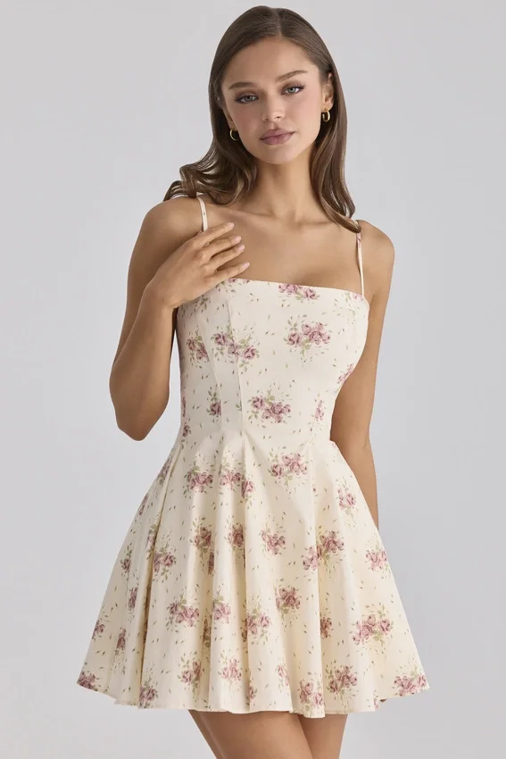 Dolly Elfenbeinfarbenes Vintage-Mini-Sommerkleid aus Baumwolle mit Rosenprint Dolly Elfenbeinfarbenes Vintage-Mini-Sommerkleid aus Baumwolle mit Rosenprint