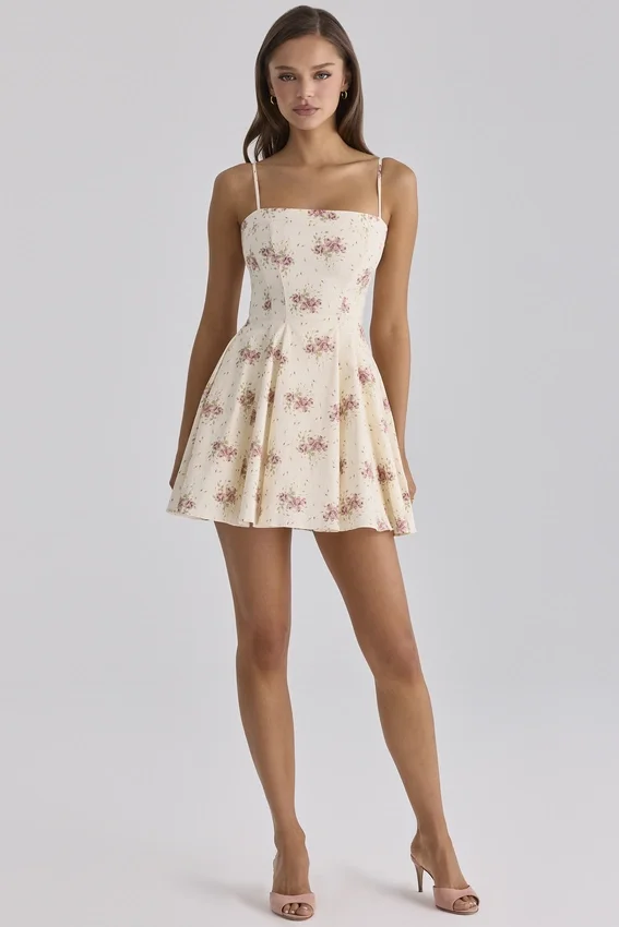 Dolly Elfenbeinfarbenes Vintage-Mini-Sommerkleid aus Baumwolle mit Rosenprint Dolly Elfenbeinfarbenes Vintage-Mini-Sommerkleid aus Baumwolle mit Rosenprint