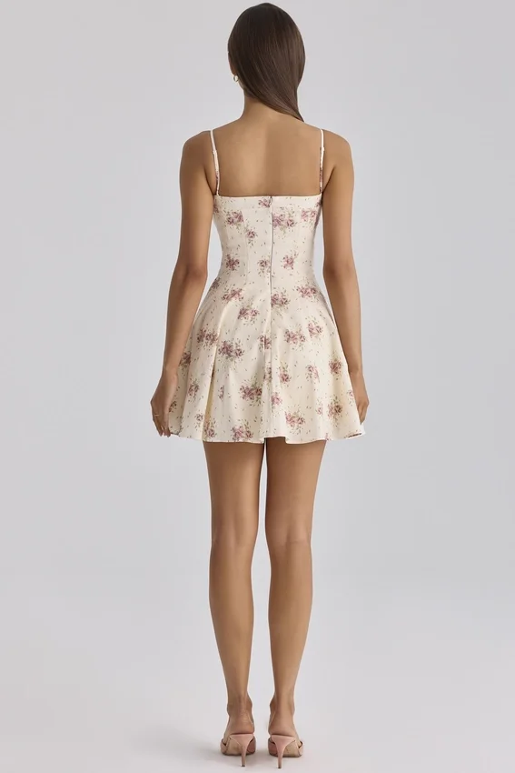 Dolly Elfenbeinfarbenes Vintage-Mini-Sommerkleid aus Baumwolle mit Rosenprint Dolly Elfenbeinfarbenes Vintage-Mini-Sommerkleid aus Baumwolle mit Rosenprint