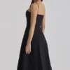 Dolly – Schwarzes, ausgestelltes Midi-Sommerkleid aus Baumwolle Dolly – Schwarzes, ausgestelltes Midi-Sommerkleid aus Baumwolle